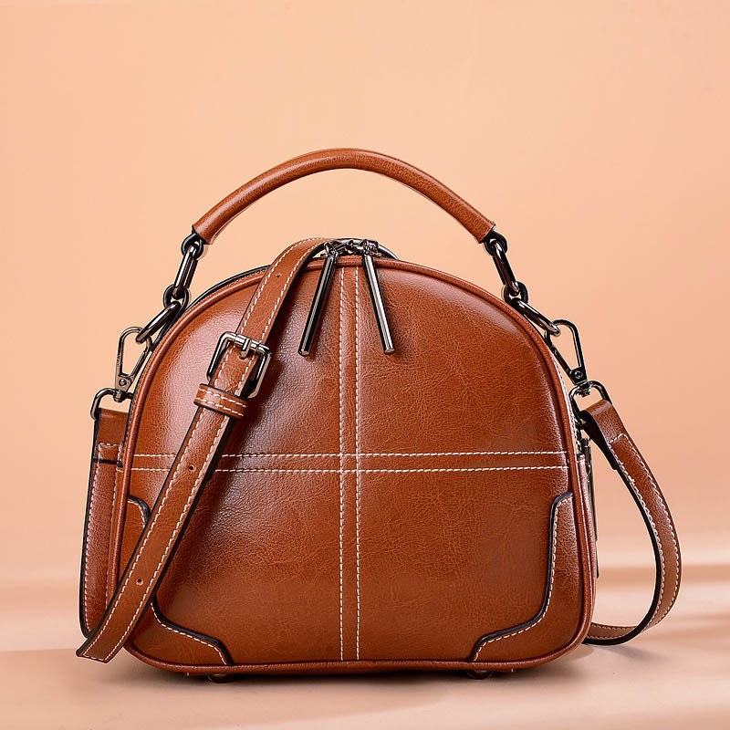 Leren dameshandtas met compact formaat en elegante vorm