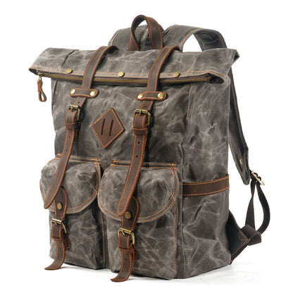 Vintage herenrugzak met stevige canvas buitenkant en leren details
