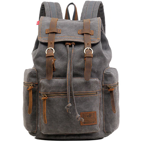 Open vintage canvas rugzak met zichtbaar hoofdvak