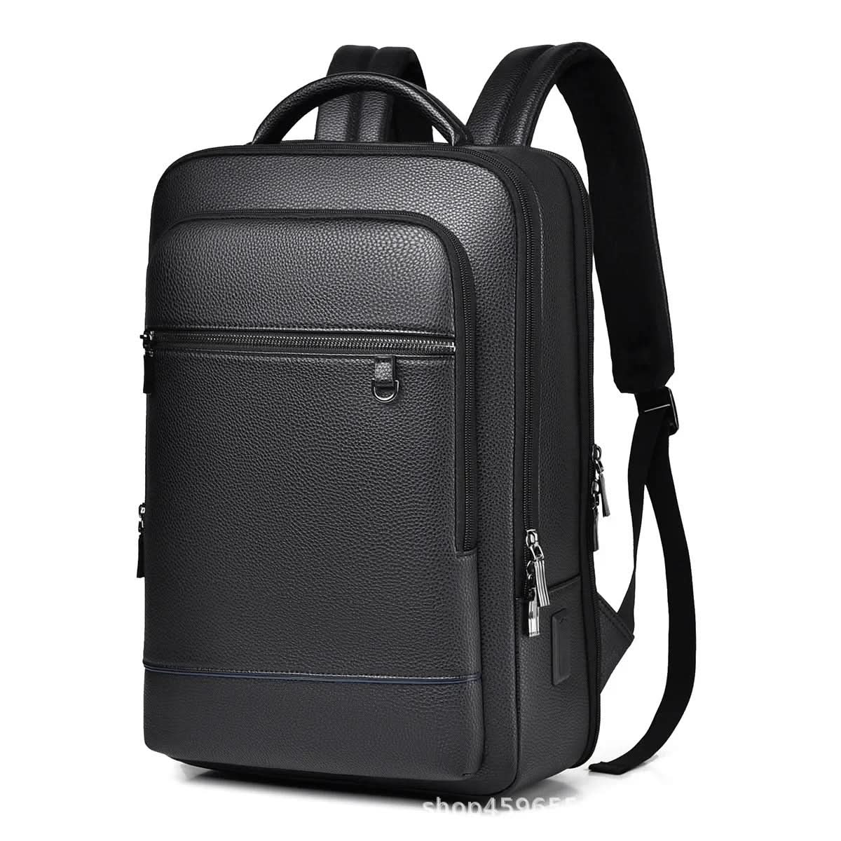 Laptoprugzak naast een laptop van 15,6 inch