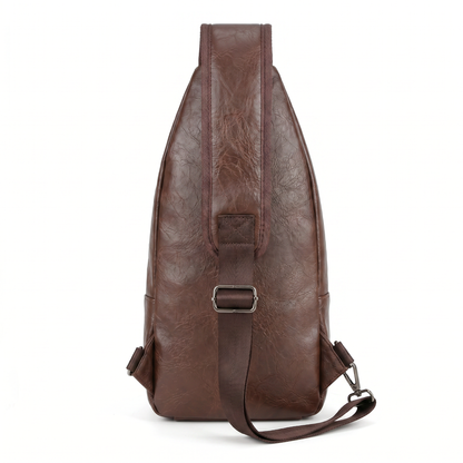 Achterzijde van de bruine leren crossbodytas
