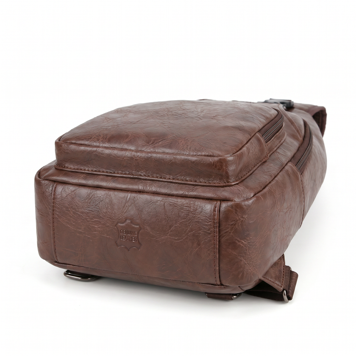Bruine leren crossbodytas naast dagelijkse accessoires