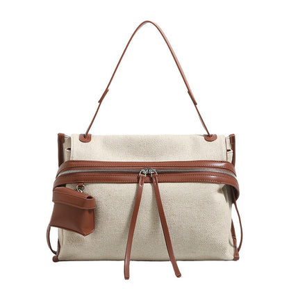 Stijlvolle canvas tote bag met leren details in een alledaagse look
