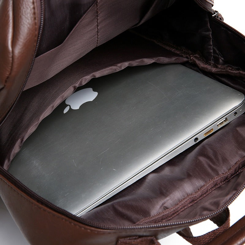 Leren laptoprugzak met ruim hoofdvak voor laptop en accessoires